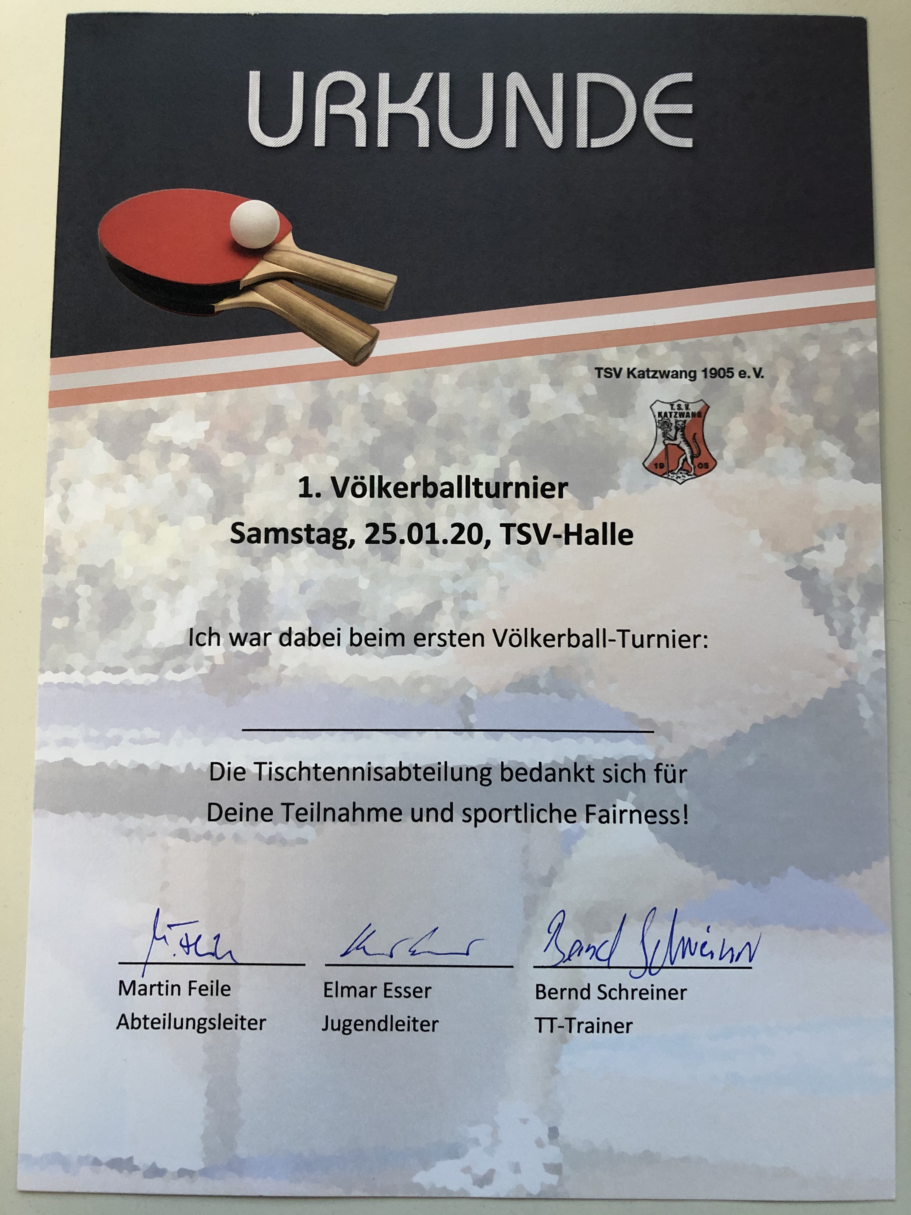 Teilnehmerurkunde unterzeichnet